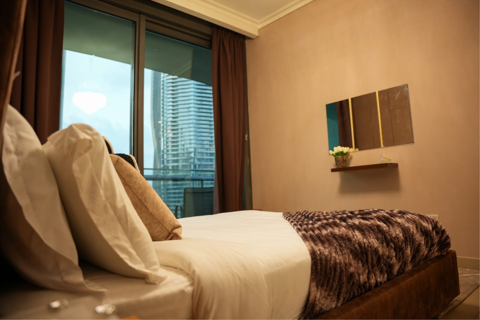 Comfortable bedroom at the Burj Vista residence